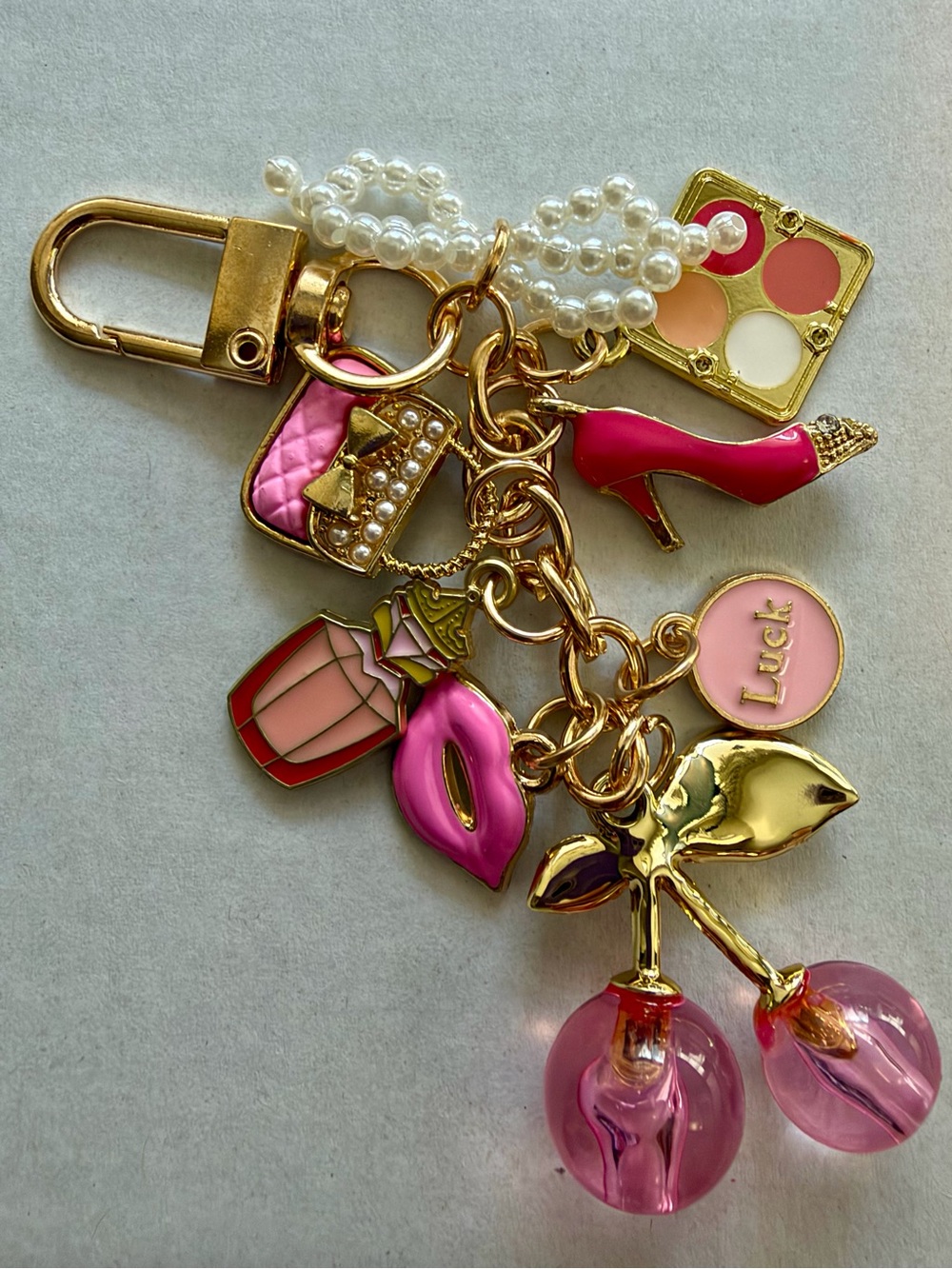 Gold-Tone Pink Charm Keychain with Pearls and Cherry Charms
